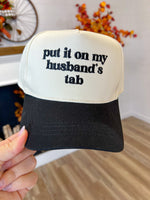 Put It On My Husband's Tab Hat-Black